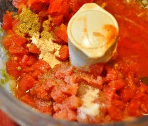 tomatoes and seasonings in food processor