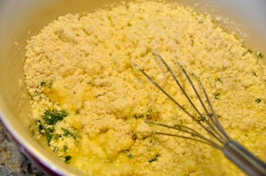 Mixing wet and dry ingredients for pizza muffins