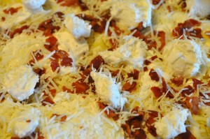 Cheese and bacon pizza before baking