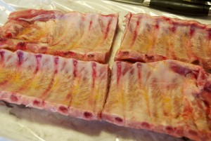 spare ribs cut in half and seasoned