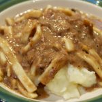 Beef and Noodles over mashed potatoes