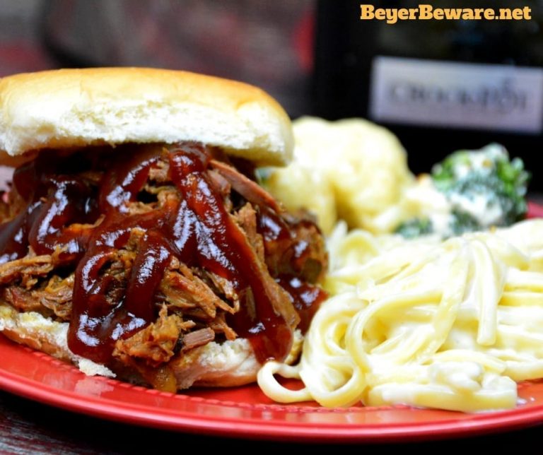 This slow cooker root beer beef bbq recipe is the perfect combination of sweet and heat with a hint of smoke to leave your summer BBQ cravings satisfied. 