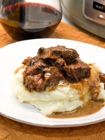 This Crock Pot Beef Roast with Red Wine and Mushrooms is the perfect tender and savory slow cooker recipe. Easy to make, packed with flavor, and ideal for weeknight dinners!