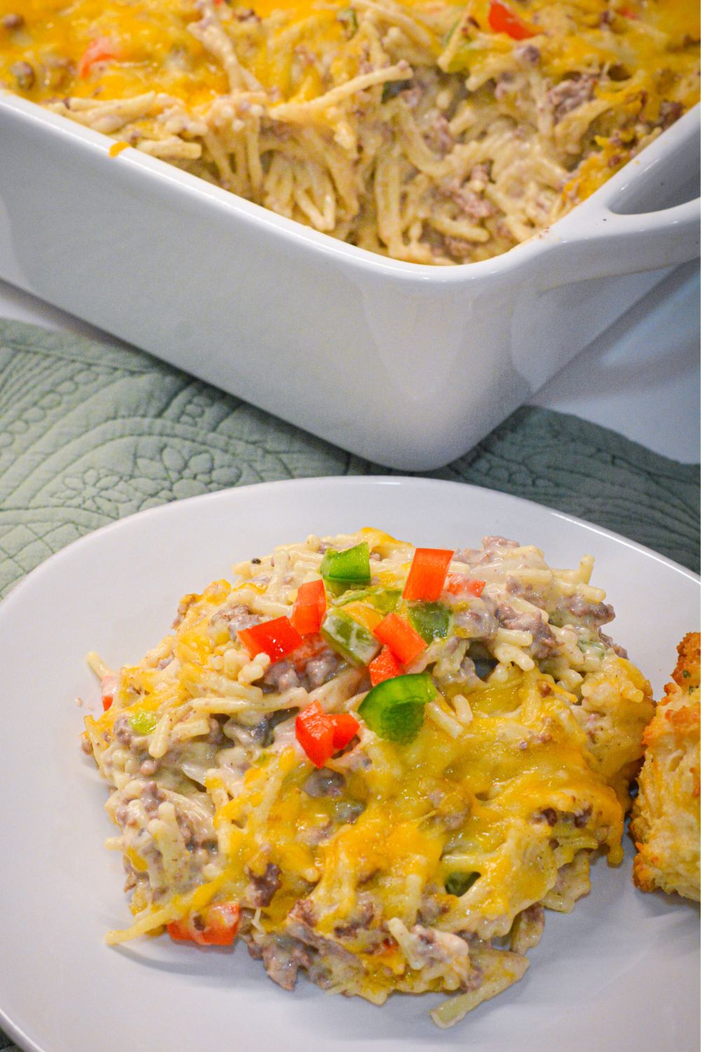 Cheesy and comforting, this Creamy Hamburger Spaghetti Casserole is the perfect weeknight dinner. Made with ground beef, spaghetti, cream cheese, and Colby-Jack cheese, it's easy and delicious!