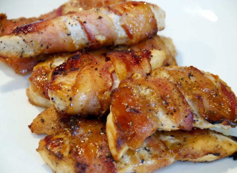 A baked honey mustard bacon wrapped chicken tenders fit perfectly into little hands and is an easy chicken recipe the whole family will love.