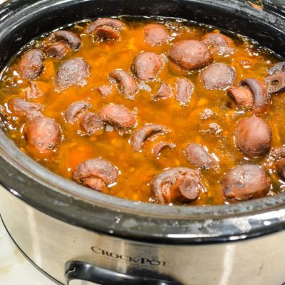 Learn how to make perfectly tender slow cooker mushrooms and onions with just 5 ingredients. This easy crockpot recipe creates a delicious savory side dish that pairs wonderfully with steaks, pasta, or your favorite main courses.