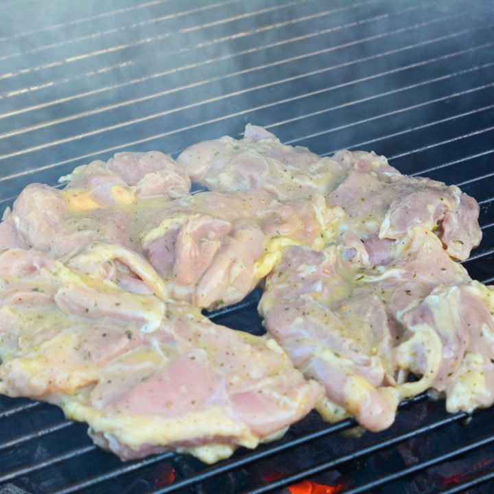 Remove the chicken from the marinade, letting any excess drip off. Discard the remaining marinade. Place the chicken breasts on the preheated grill.