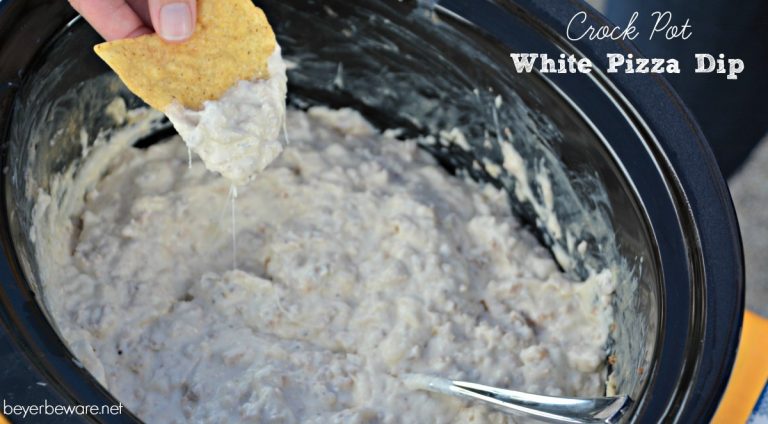 Crock Pot White Pizza Dip recipe is a great alternative to the traditional sausage queso dip. Brings all the flavors from pizza on the end of chip.