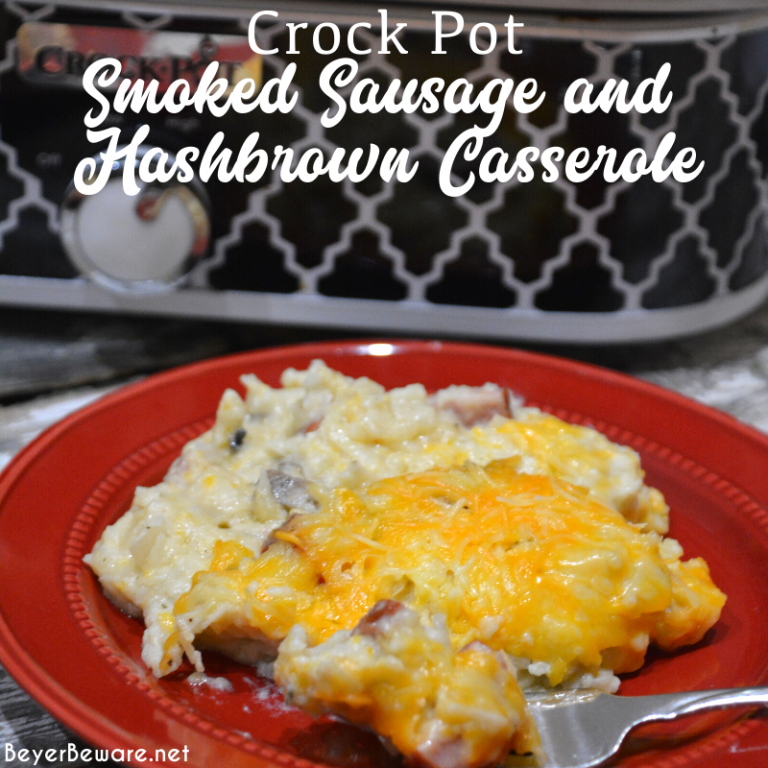 Crockpot smoked sausage and hashbrown casserole is a simple cheesy sausage and potato recipe made with frozen hash browns, sour cream, onions, cream of mushroom soup, smoked sausage, and shredded cheese that is a great weeknight meal in my beloved casserole crock pot.