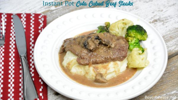 Instant Pot Coca-Cola Cubed Beef Steaks is a simple recipe made quickly with the dump of cubed steaks, a Coke, onion soup mix and cream of mushroom soup in the Instant Pot.