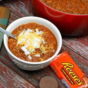 Discover the bold combination of savory chili and sweet Reese's Peanut Butter Cups in this unique recipe. Perfect for adventurous food lovers and fall comfort food fans!