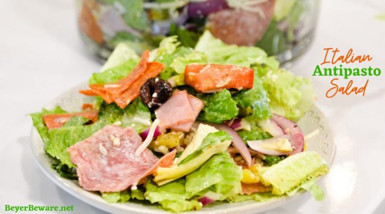 Italian antipasto salad is a hearty dinner salad with a romaine lettuce base and filled up with salami, pepperoni, tomatoes, cucumbers, onions, olives, banana peppers, and cheese dressed with a homemade Italian dressing.