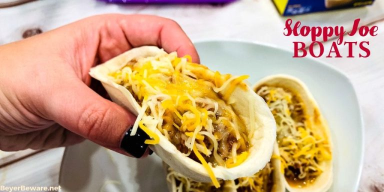 Sloppy Joe Boats is the easy way to eat your sloppy joe recipe without the mess by fill taco boat shells with sloppy joe and topping off with cheese. 