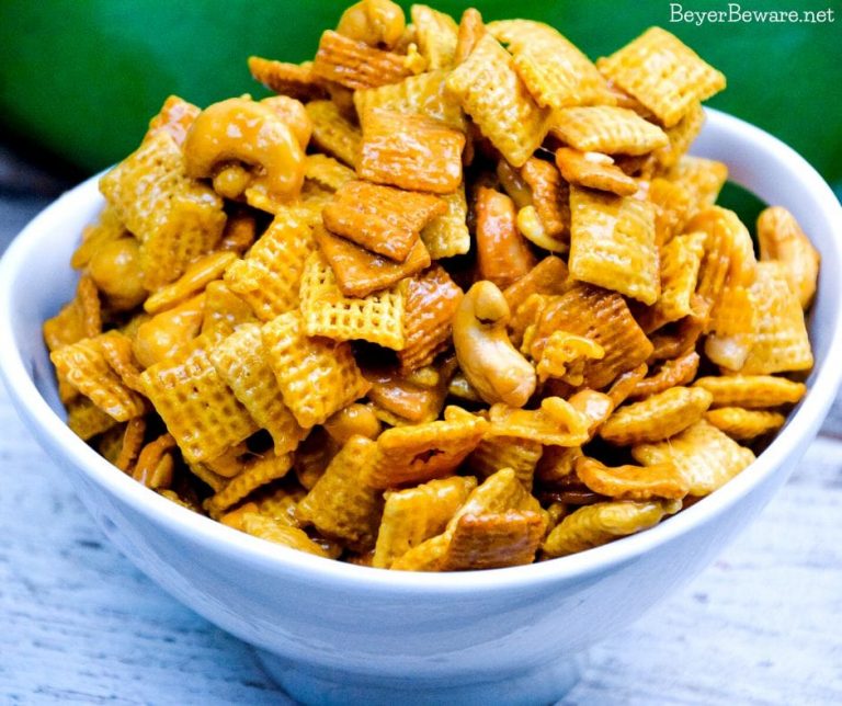 Caramel Cashew Chex Mix is a sweet caramel coated Chex and Golden Graham cereal mix that also includes the buttery and salty addition of cashews.