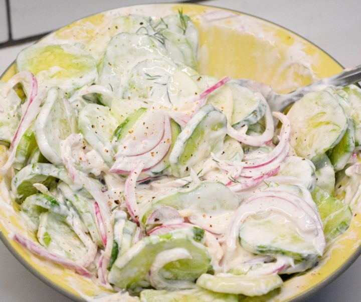 Cucumbers and sour cream salad is a creamy cucumber salad that is tangy with a hint of spice from the combination of cucumbers, onions, sour cream, hot sauce, dill weed, and vinegar.