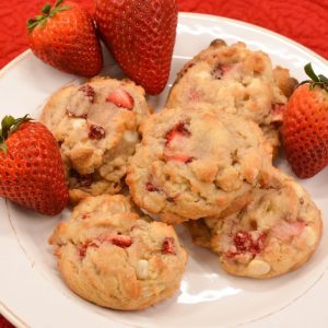 Strawberry Cheesecake Cookies are a pudding cookie recipe made with cheesecake pudding, fresh strawberries and white chocolate chips.