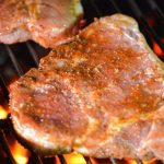 The secret to grilling pork chops? A perfectly balanced homemade dry rub that brings out the best in your meat.