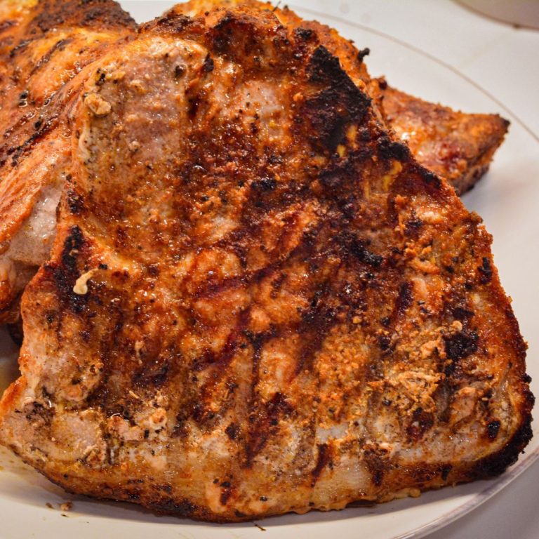 The secret to grilling pork chops? A perfectly balanced homemade dry rub that brings out the best in your meat.