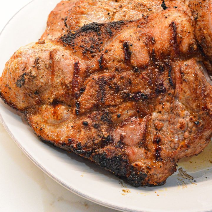 Once the pork chops are done, remove them from the grill and let them rest for about 5 minutes. 
