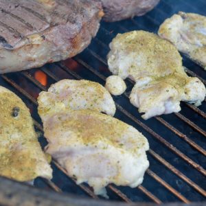 Season the Chicken for the Grill: Remove the chicken from the brine and pat it dry with paper towels. Discard the brine. Lightly season the chicken with Dan-O chicken seasoning or salt and pepper on