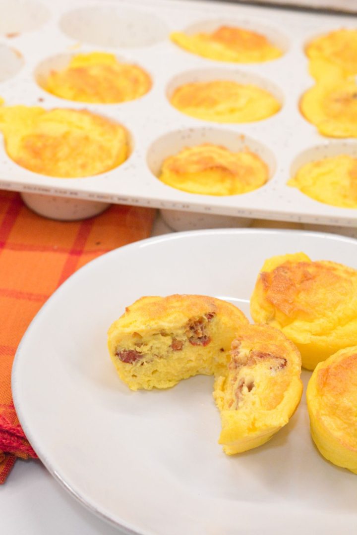 Create the high-protein egg bites with cottage cheese for an easy high-protein breakfast all week long by using a silicone muffin pan with pureed cottage cheese, eggs, bacon, and cheese.