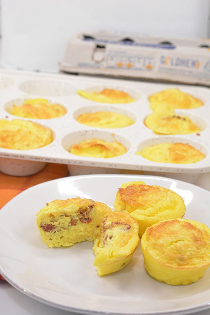 Create the high-protein egg bites with cottage cheese for an easy high-protein breakfast all week long by using a silicone muffin pan with pureed cottage cheese, eggs, bacon, and cheese.