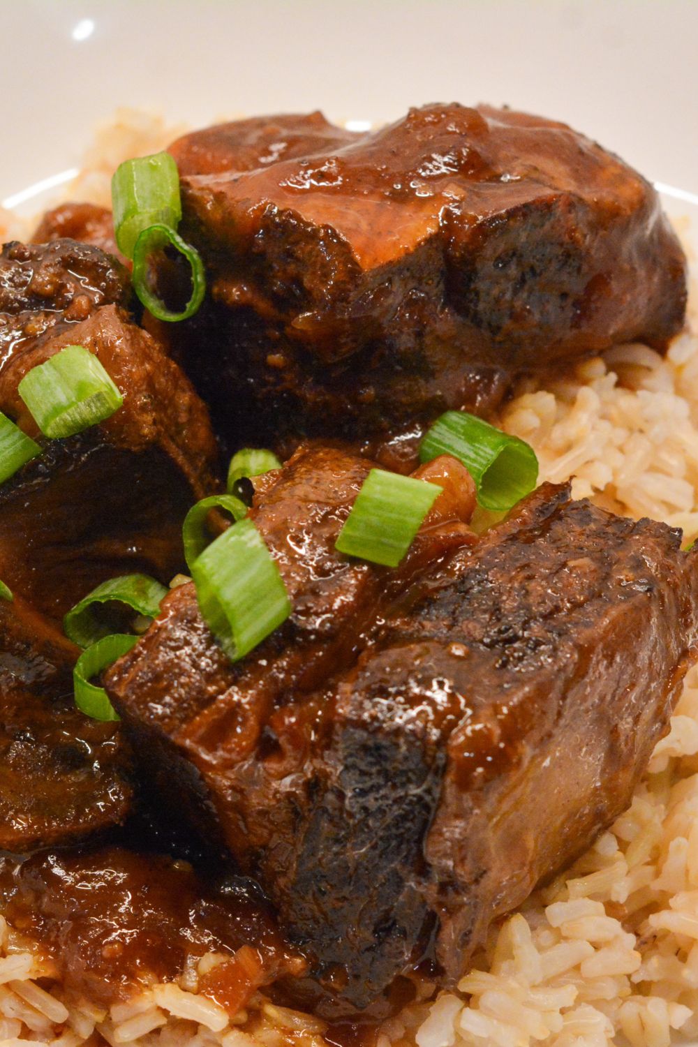 Enjoy this easy Crock Pot Korean Short Ribs recipe with tender beef, savory and spicy flavors, and a delicious sauce. Perfect for a busy weeknight dinner! Includes tips, variations, and gluten-free substitutions.