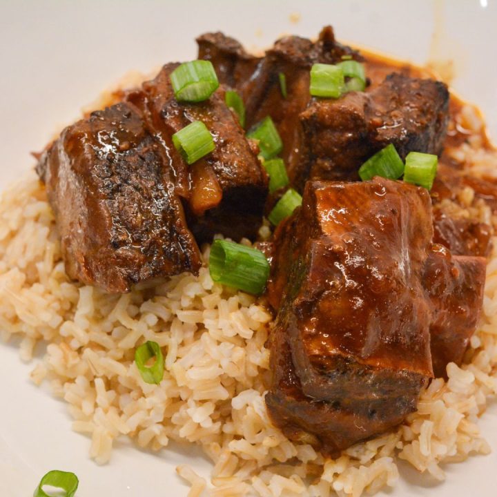 Enjoy this easy Crock Pot Korean Short Ribs recipe with tender beef, savory and spicy flavors, and a delicious sauce. Perfect for a busy weeknight dinner! Includes tips, variations, and gluten-free substitutions.