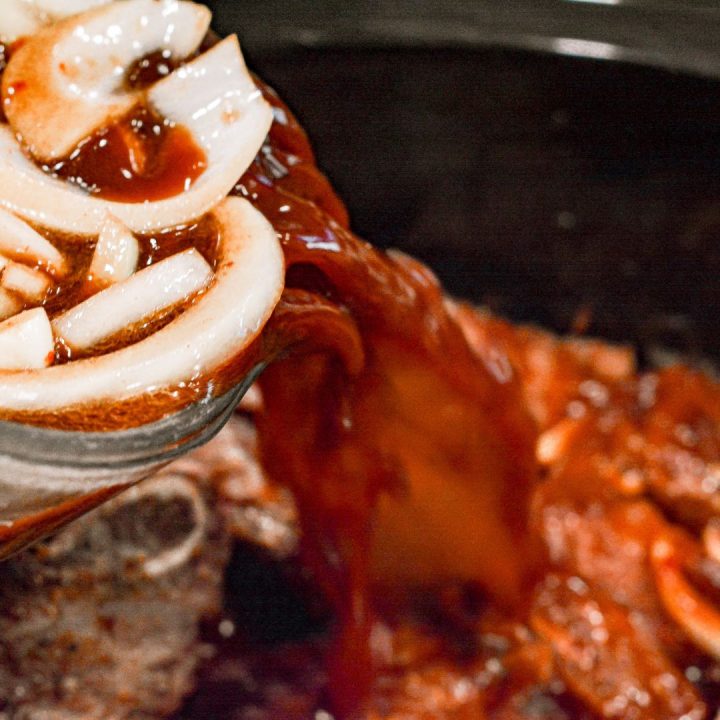 Pour the prepared sauce over the short ribs in the crock pot, ensuring the ribs are fully covered. Finally cover the crock pot and cook on low heat for 6-8 hours or until the ribs are tender and the meat falls off the bone.