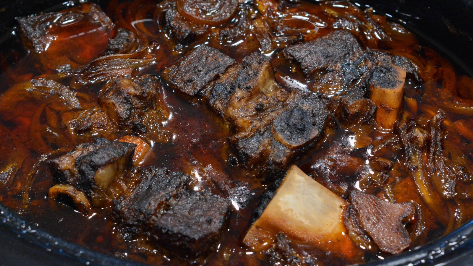 Return the ribs to the thickened sauce in the crock pot and let them soak up the flavors for a few minutes. If desired, serve the Korean beef short ribs over brown rice garnished with green onions or sesame seeds. 