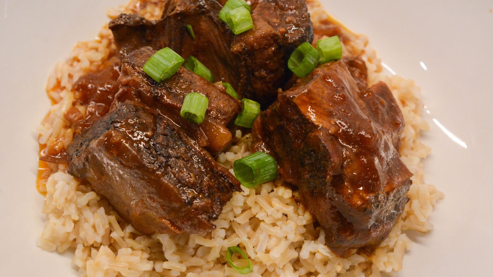 Enjoy this easy Crock Pot Korean Short Ribs recipe with tender beef, savory and spicy flavors, and a delicious sauce. Perfect for a busy weeknight dinner! Includes tips, variations, and gluten-free substitutions.