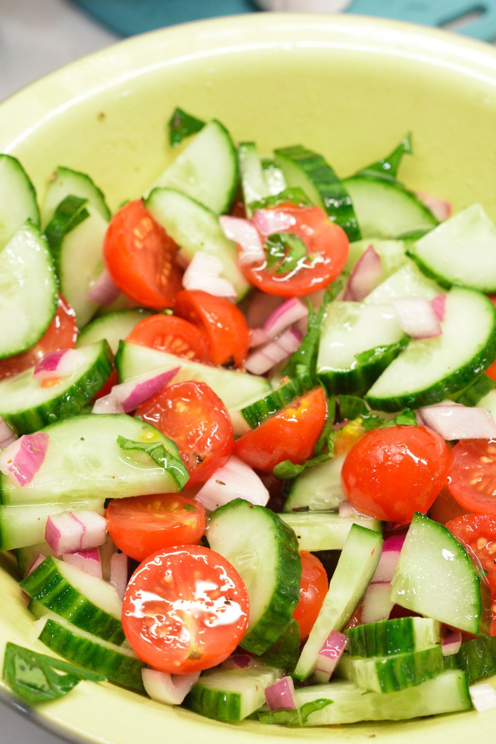 Cucumber and tomato salad is the perfect summer salad with homemade dressing that can be a high protein cucumber, tomato, and onion salad with cottage cheese.