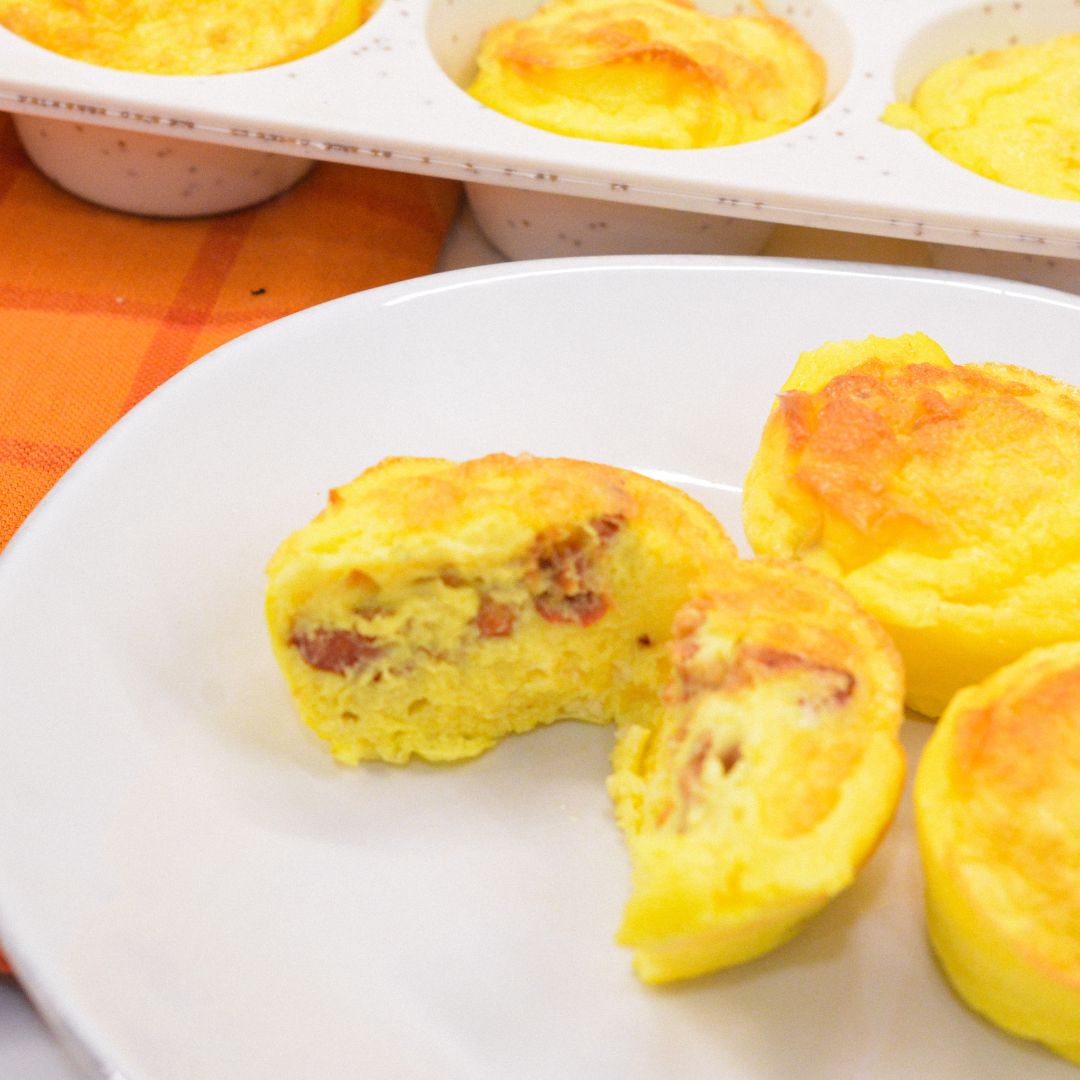 Create the high-protein egg bites with cottage cheese for an easy high-protein breakfast all week long by using a silicone muffin pan with pureed cottage cheese, eggs, bacon, and cheese.