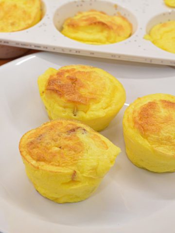 Create the high-protein cottage cheese egg bites for an easy high-protein breakfast all week long by using a silicone muffin pan with pureed cottage cheese, eggs, bacon, and cheese.