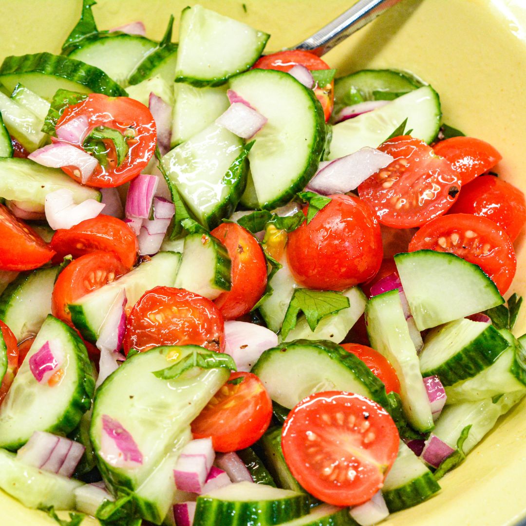 Cucumber and tomato salad is the perfect summer salad with homemade dressing that can be a high protein cucumber, tomato, and onion salad with cottage cheese.