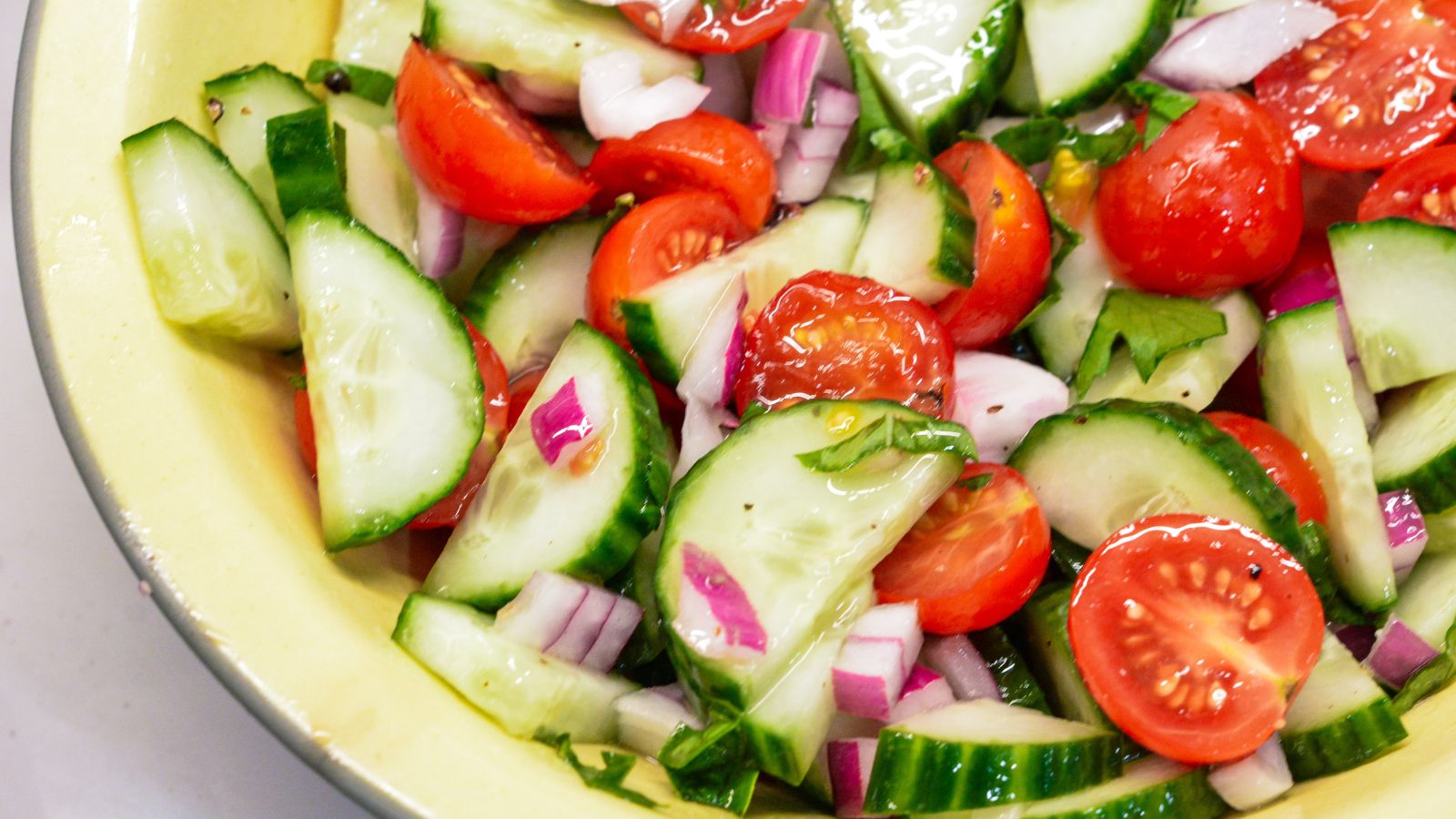 Cucumber and tomato salad is the perfect summer salad with homemade dressing that can be a high protein cucumber, tomato, and onion salad with cottage cheese.