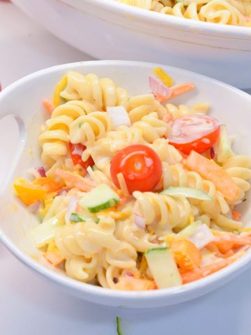 Before serving, give the sweet macaroni salad a gentle stir and garnish with fresh parsley or dill if desired. Serve it chilled and enjoy the delightful combination of flavors and textures.