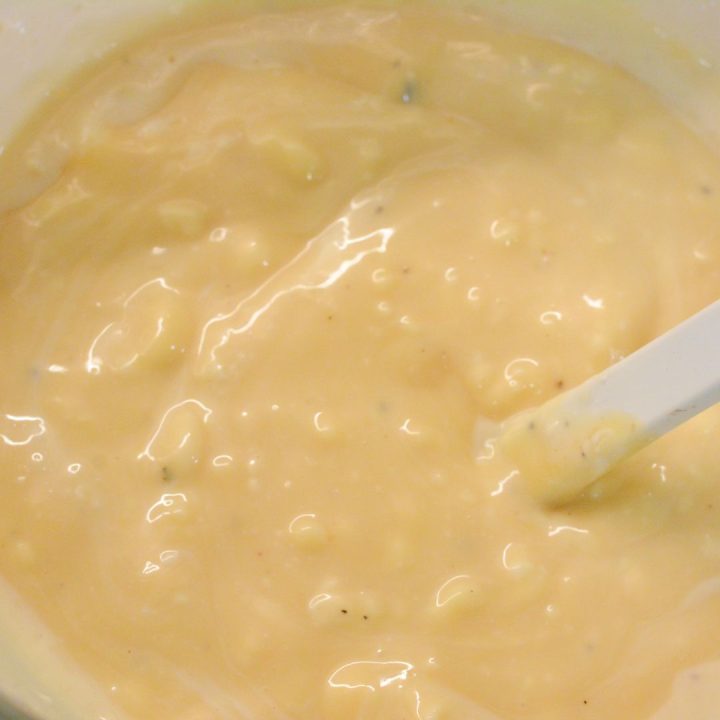 In a large mixing bowl, combine the sweetened condensed milk, vinegar, mayo, Italian Dressing salt, and black pepper. Whisk until smooth and well combined.