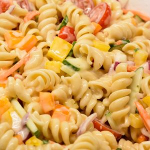 Cover the pasta salad with plastic wrap or transfer it to an airtight container. Refrigerate for at least 2 hours or overnight to allow the flavors to meld together.