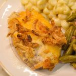 Discover an easy and delicious recipe for easy oven baked pork chops topped with ranch, Colby Jack cheese, and crispy French fried onions.