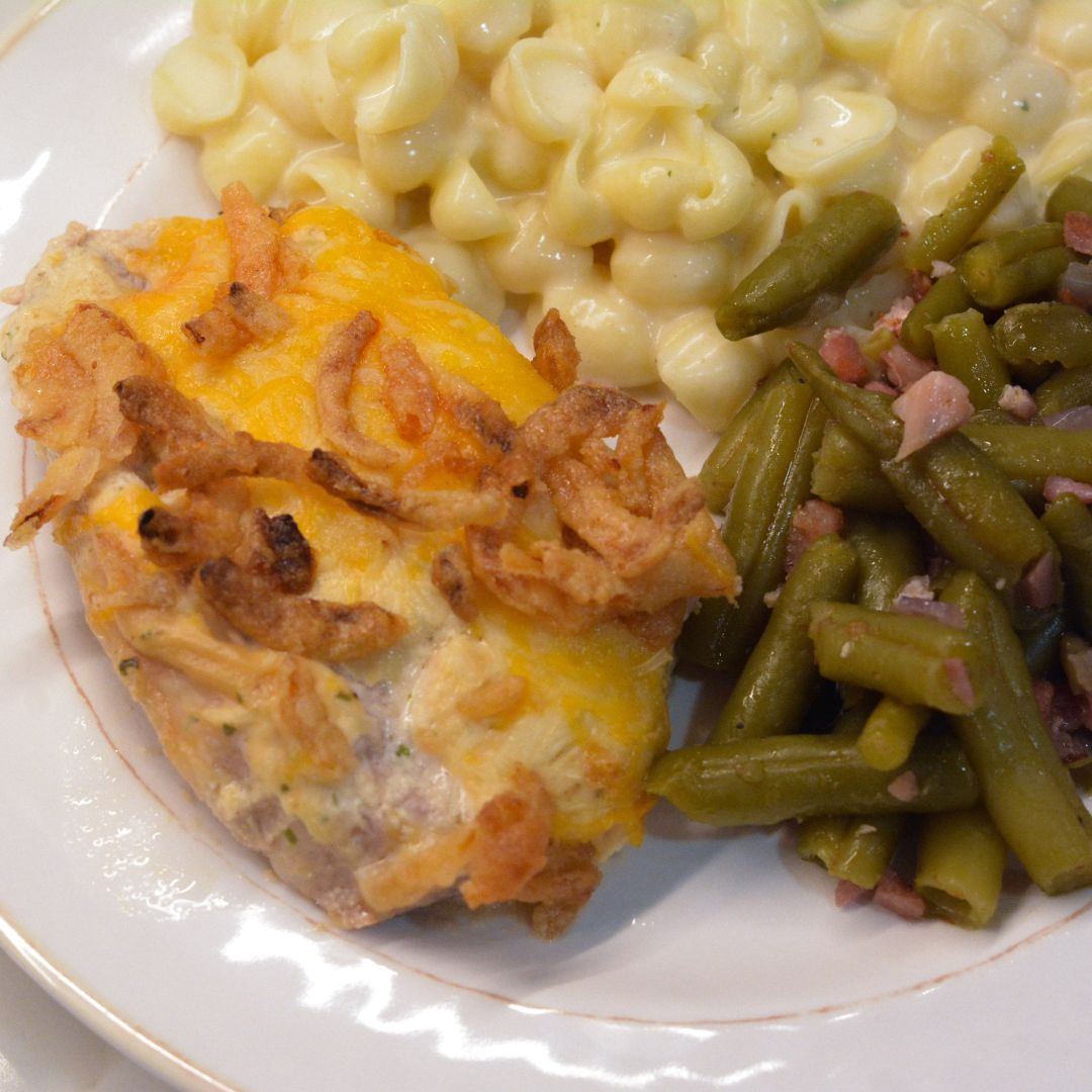 Discover an easy and delicious recipe for easy oven baked pork chops topped with ranch, Colby Jack cheese, and crispy French fried onions.