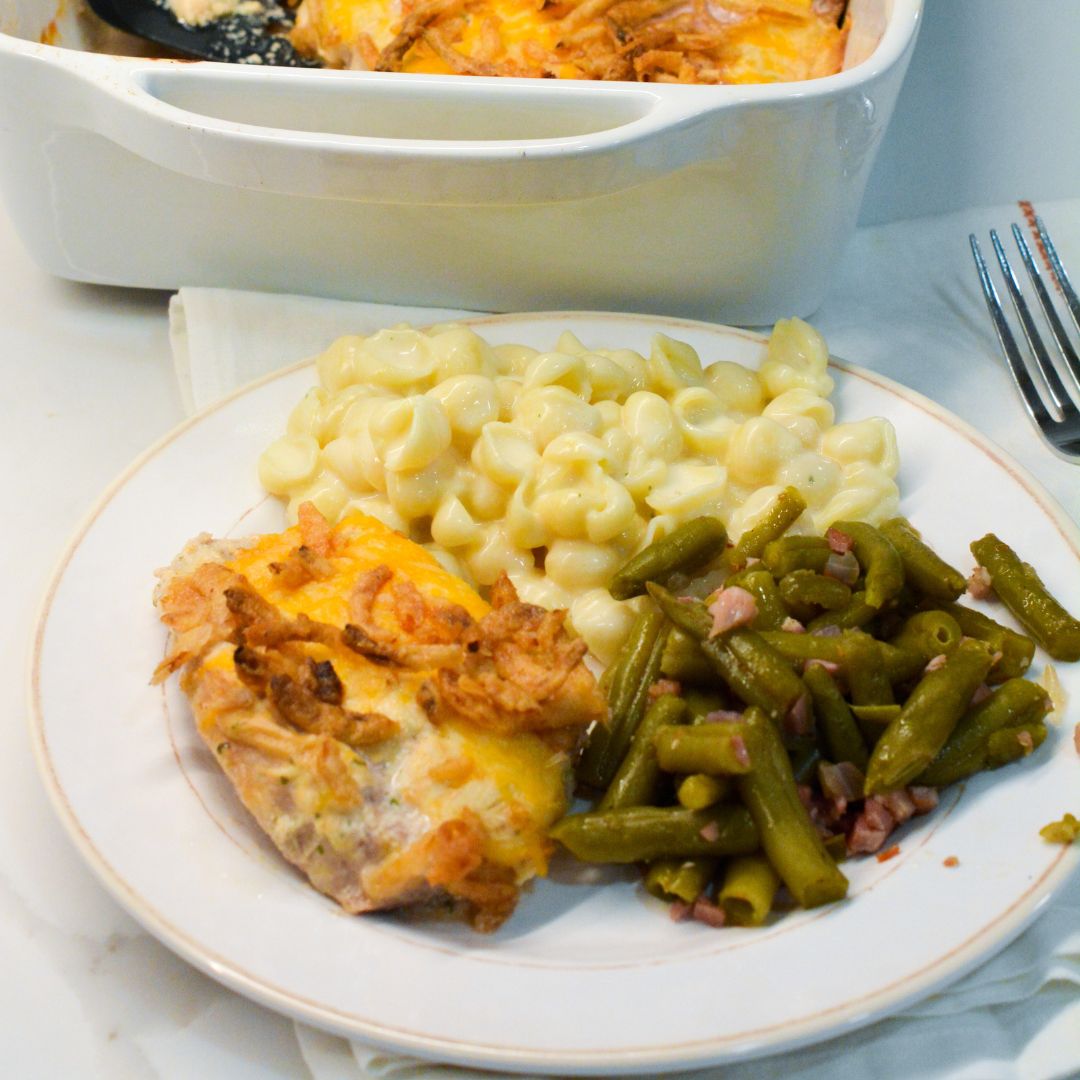 Discover an easy and delicious recipe for easy oven baked pork chops topped with ranch, Colby Jack cheese, and crispy French fried onions.