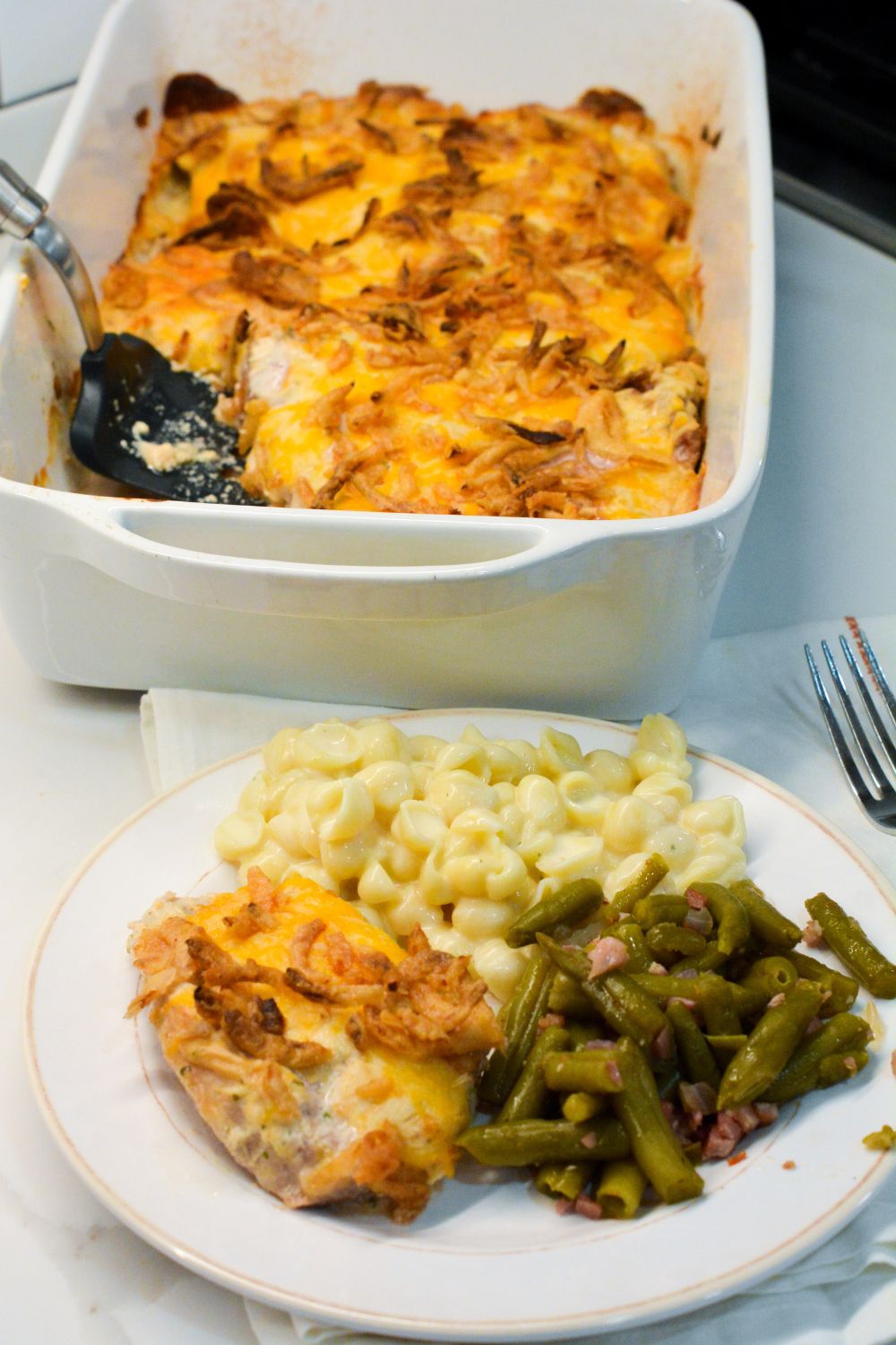 Discover an easy and delicious recipe for easy oven baked pork chops topped with ranch, Colby Jack cheese, and crispy French fried onions.