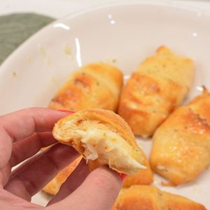 Try these delicious Air Fryer Crescent Rolls stuffed with gooey mozzarella cheese and brushed with garlic butter for a crispy, buttery finish. Perfect for a quick snack or appetizer!