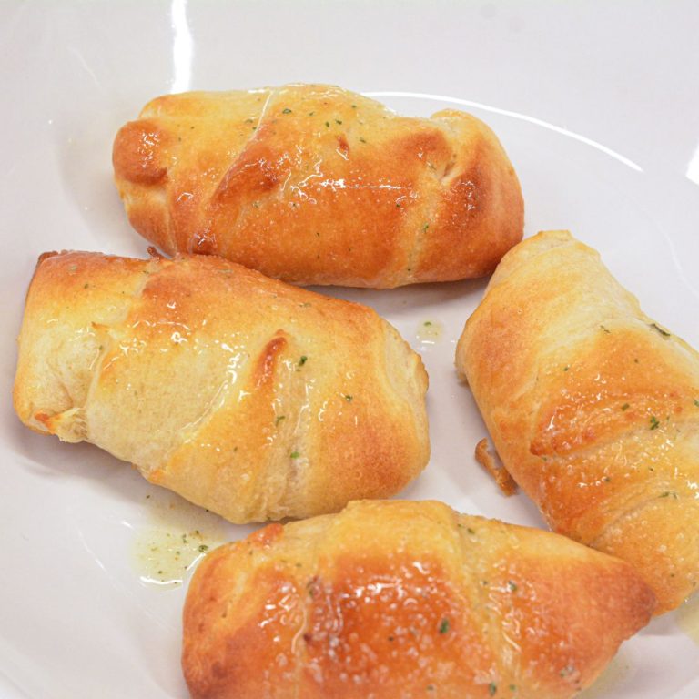 Try these delicious Air Fryer Crescent Rolls stuffed with gooey mozzarella cheese and brushed with garlic butter for a crispy, buttery finish. Perfect for a quick snack or appetizer!