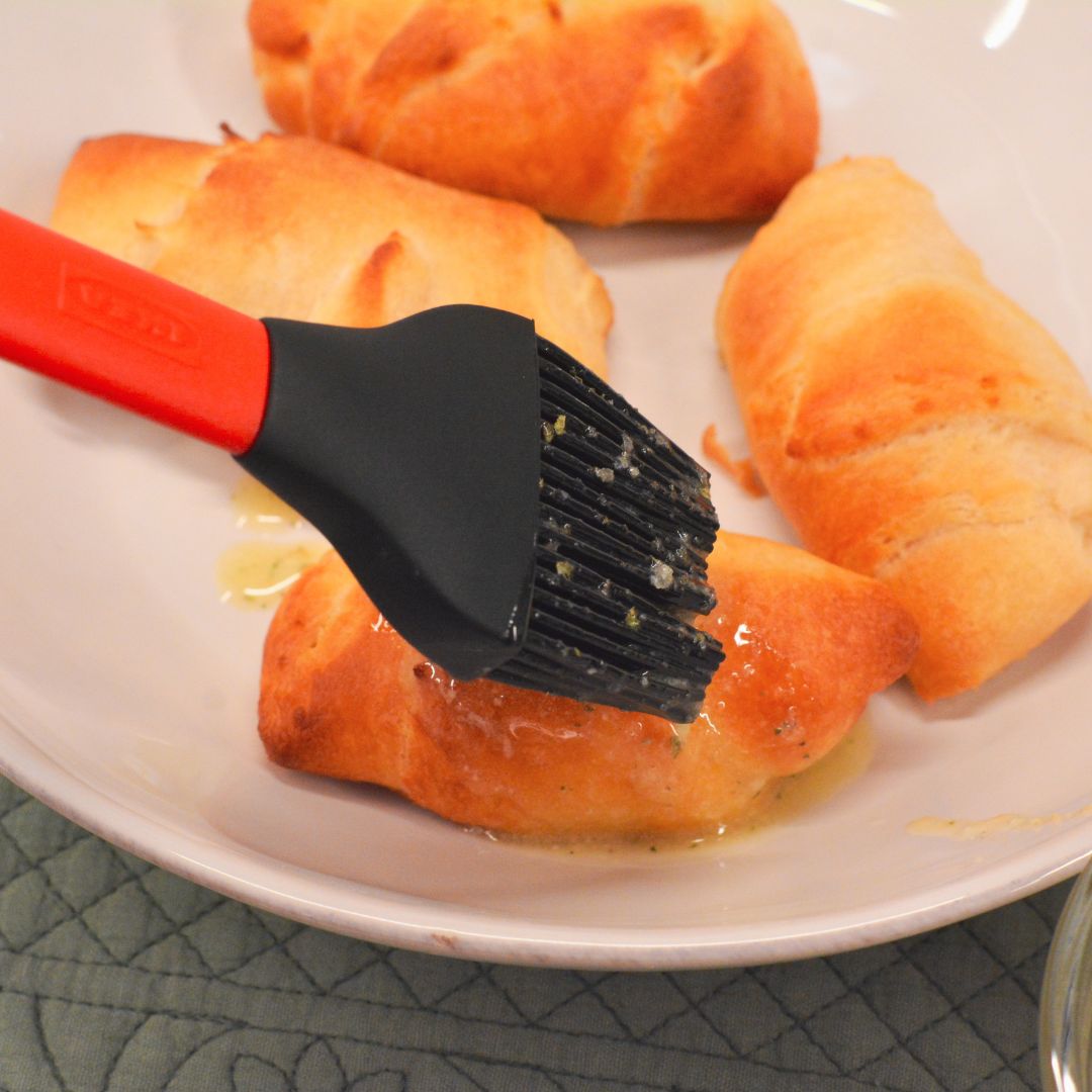 Remove the rolls from the air fryer. Melt butter add garlic salt to the butter and brush over the air fried crescent rolls.