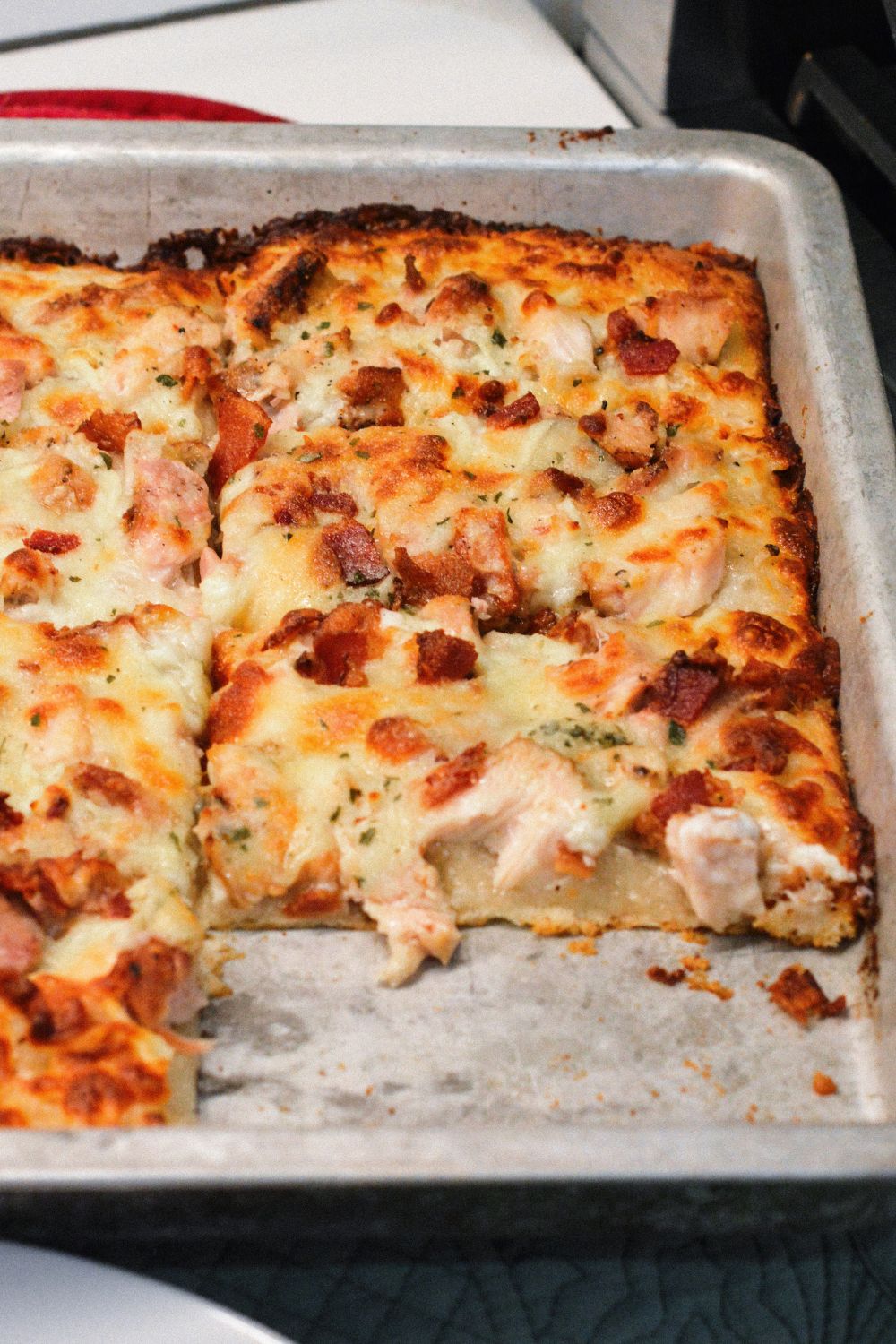 Are you a pizza lover looking for a new twist on your favorite comfort food? Our Chicken Bacon Ranch Pizza combines juicy chicken, crispy bacon, and creamy ranch dressing, all on a perfectly baked crust. 