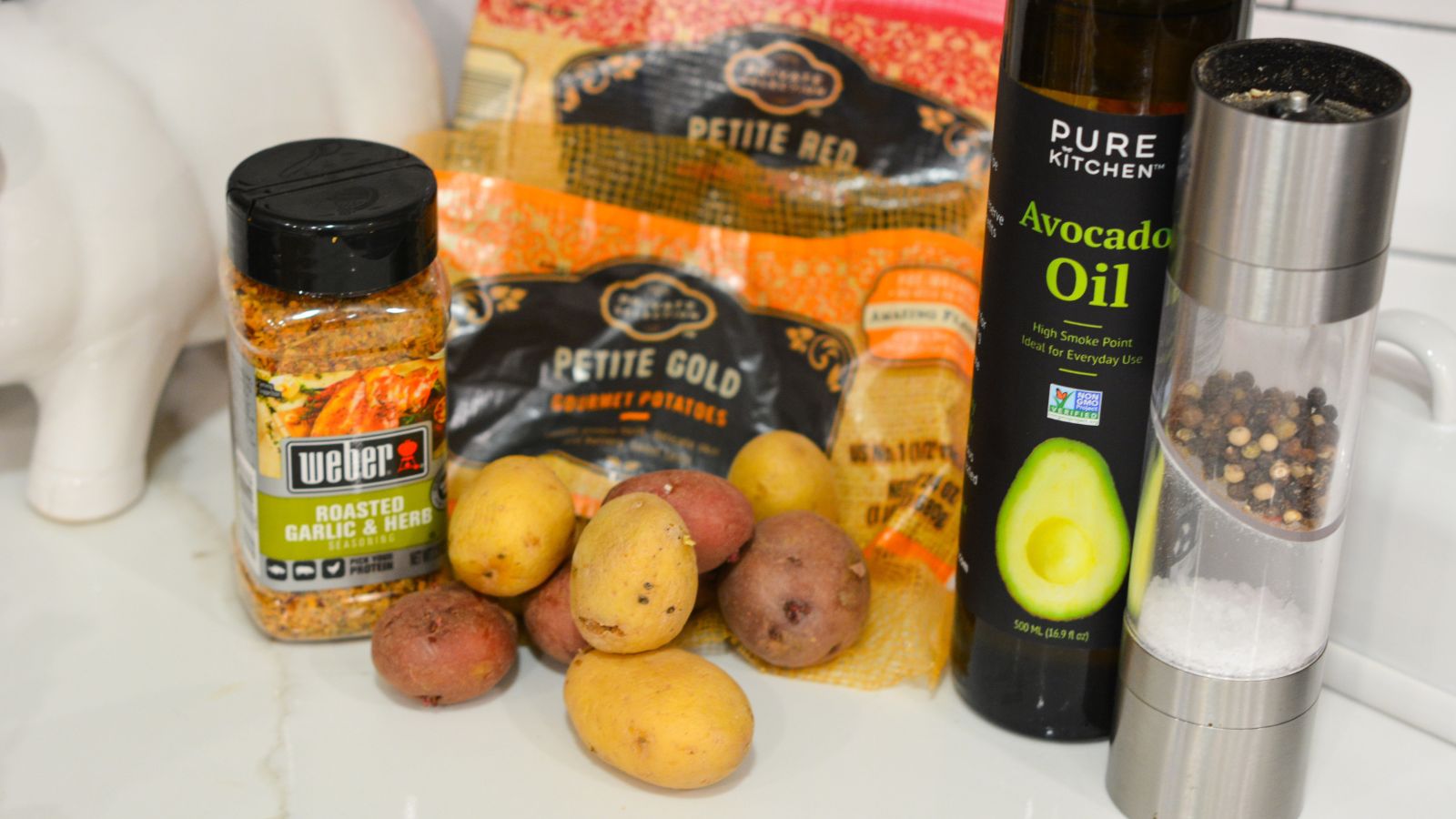 Potato Kabob ingredients - Petite red potatoes, petite gold potatoes, avocado oil, roasted garlic and herb seasoning.