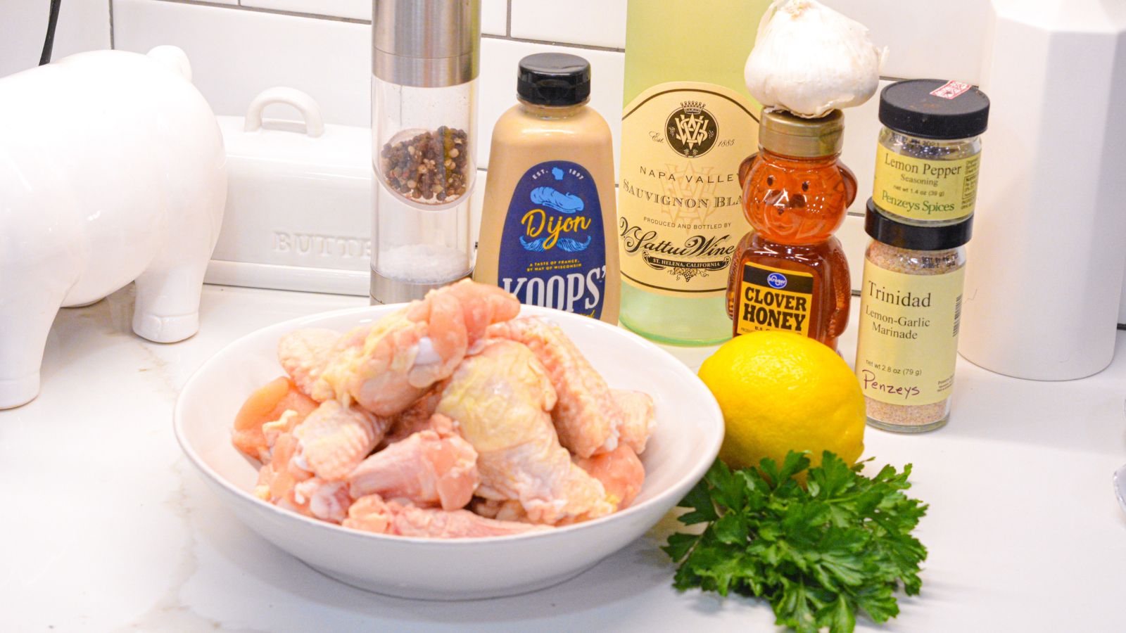 Chicken wings

Lemon Pepper seasoning

Honey

Dijon mustard

Lemon

White wine

Garlic

Parsley

Butter

Salt and Pepper

1 teaspoon cayenne pepper (optional)