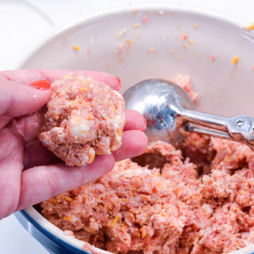 Form sausage balls: Roll the mixture into 1-inch balls, making about 20-24 sausage balls depending on size.